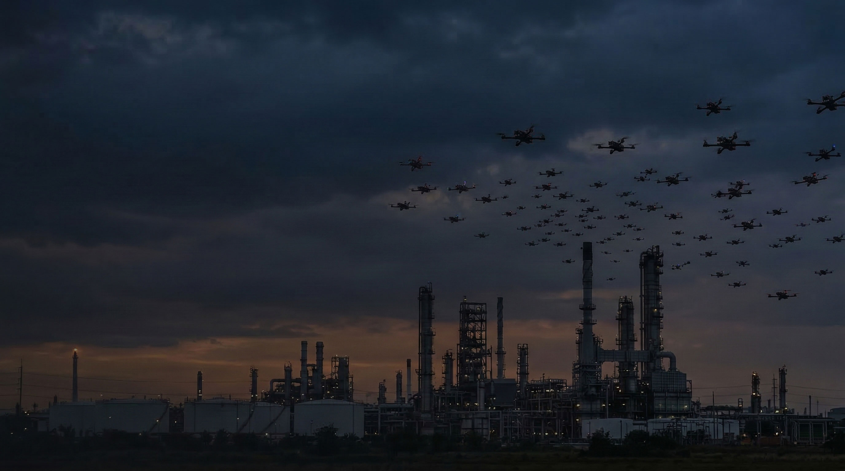Drone swarm over industrial complex at dusk